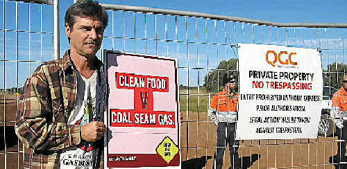 Gympie’s Jeff Douwes at the gate of the Kenya gasfield at Tara. Gympie’s Jeff Douwes at the gate of the Kenya gasfield at Tara.